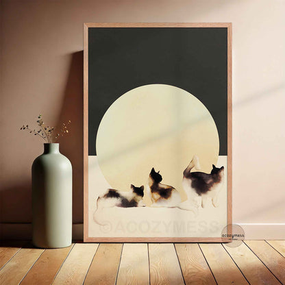 Oakwood-framed three cats wall art on dark gray with a warm beige sun shape, minimalist cat decor for modern interiors.