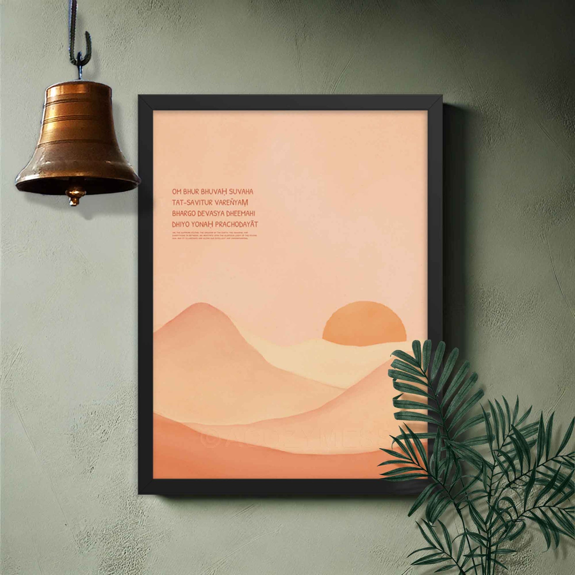 Gayatri Mantra poster featuring calming landscape art in a light color palette, displayed in a black frame, perfect for puja room decor.