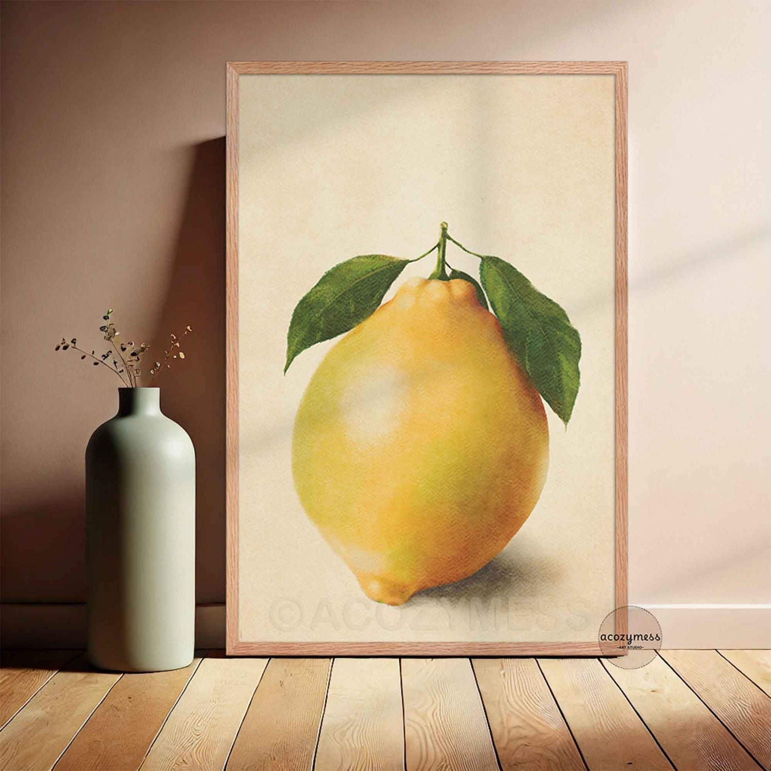oakwood Framed artwork of a lemon with leaves on a wall next to a vase.