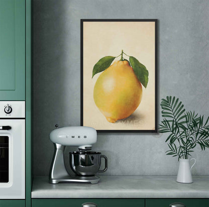 Lemon poster in a black frame, bright yellow lemon centered on soft beige background for gallery-style kitchen decor.