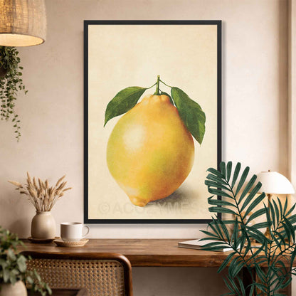 Black Framed artwork of a lemon on a wall above a wooden console table with decor items.