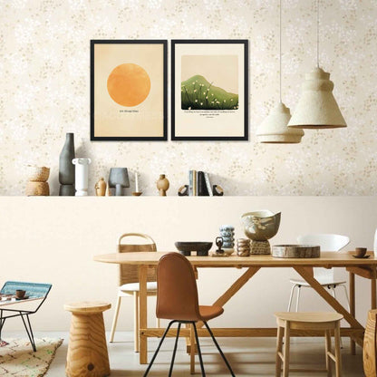 A Marcus Aurelius print in black frame featuring Marcus Aurelius' quote, "Everything we hear is an opinion, not a fact. Everything we see is a perspective, not the truth," along with a serene nature illustration of a green hill or mountain with delicate white flowers. 