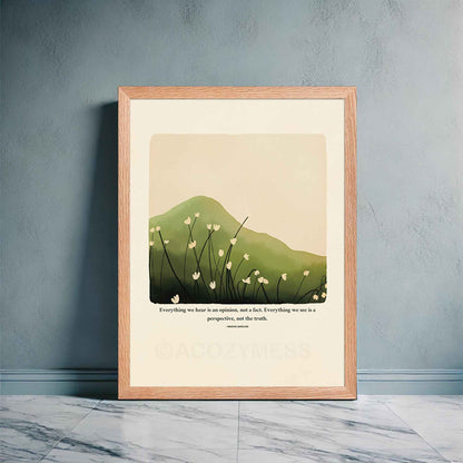 A Marcus Aurelius poster in oakwood frame featuring Marcus Aurelius' quote, "Everything we hear is an opinion, not a fact. Everything we see is a perspective, not the truth," along with a serene nature illustration of a green hill or mountain with delicate white flowers. 