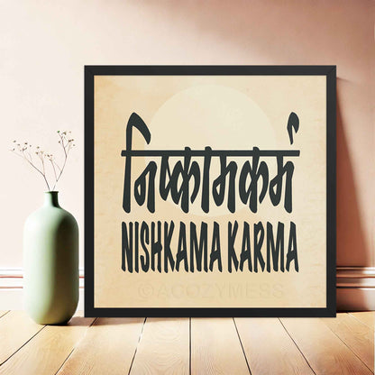 A square black-framed typography poster featuring the concept of Nishkama Karma (निष्काम कर्म) in both Hindi and English on an aged, old-paper background making it ideal for meditation and mindfulness spaces.