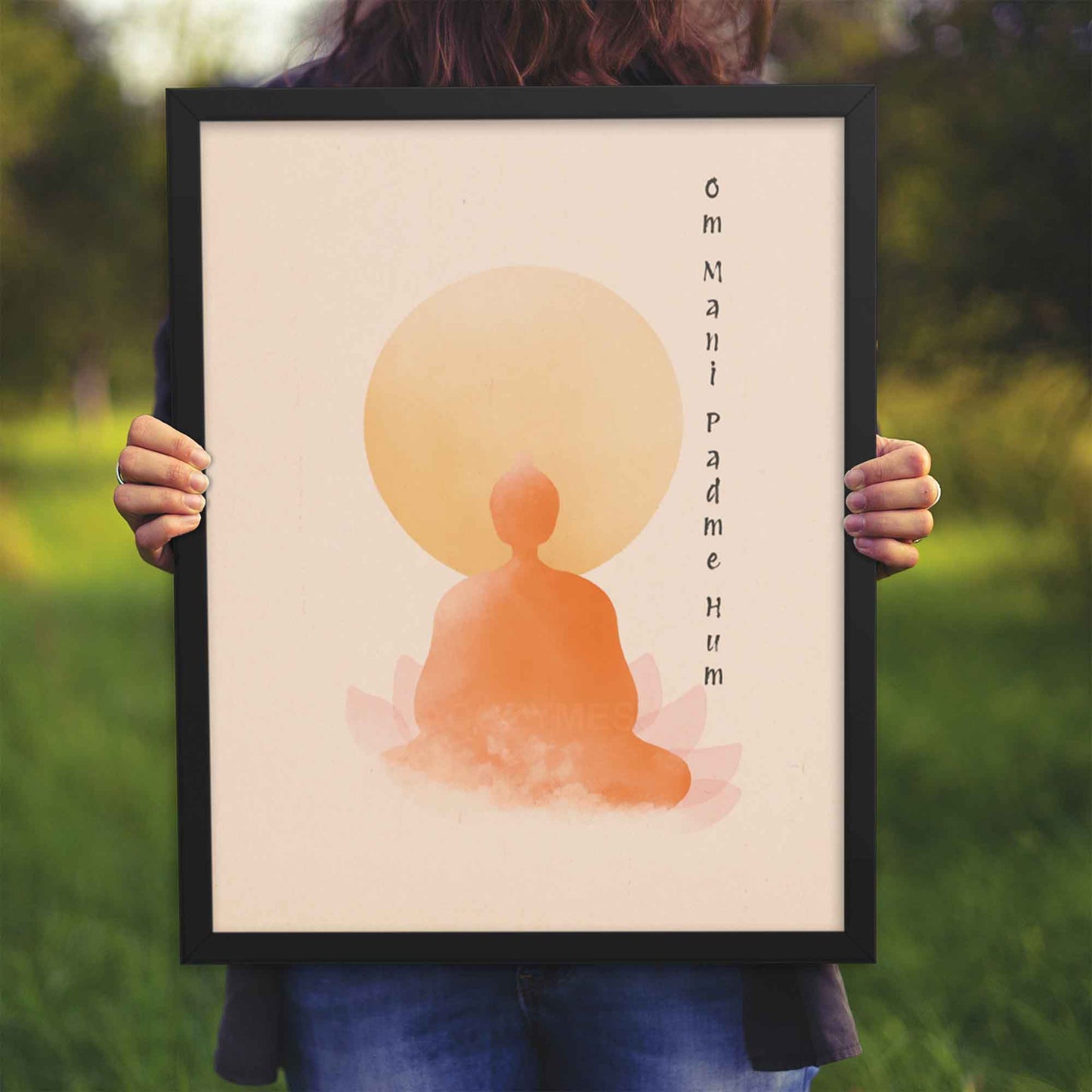 om mani padme hum poster with Buddha in meditation, lotus wall art, displayed in black frame.