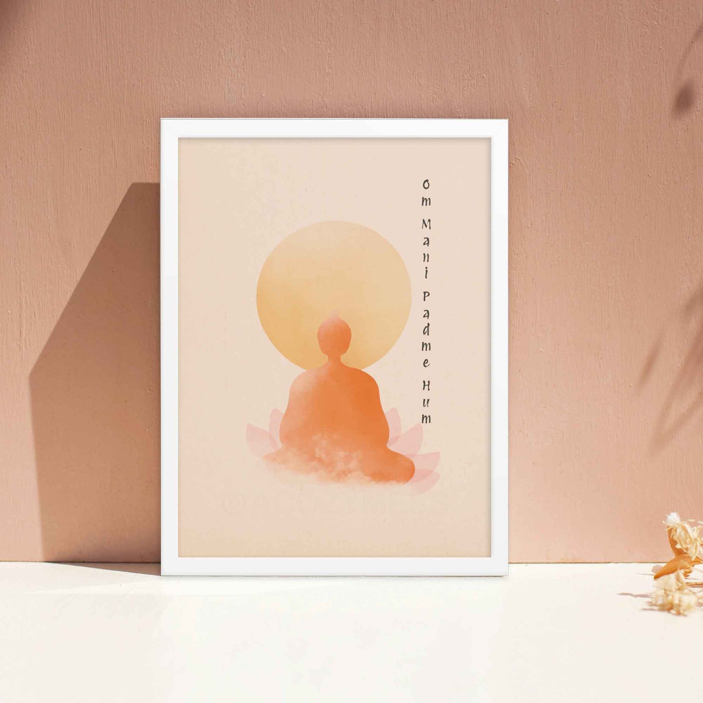 om mani padme hum poster with Buddha in meditation, lotus wall art, displayed in white frame.