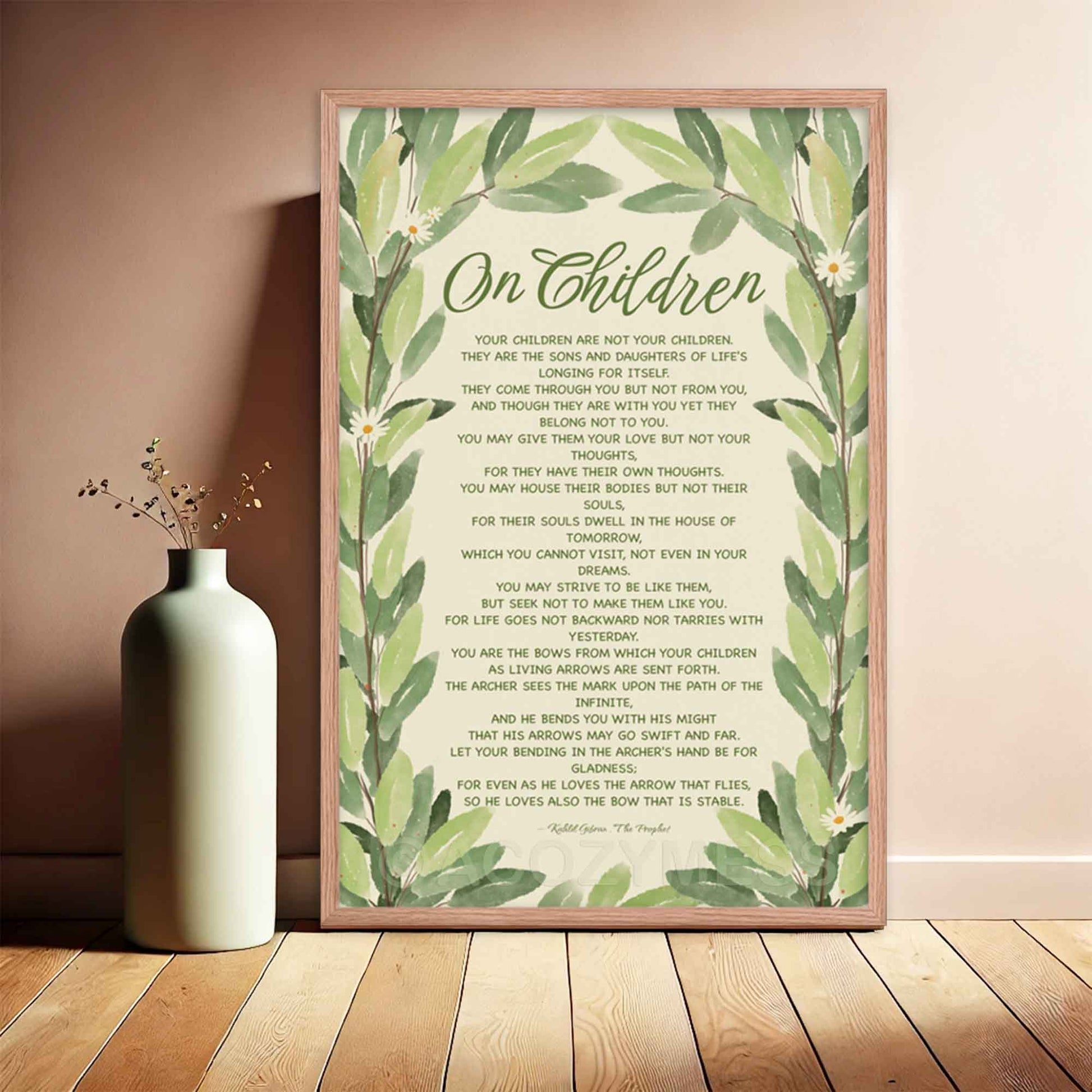 Poster featuring Kahlil Gibran’s quote, ‘Your children are not your children. They are the sons and daughters of Life’s longing for itself...’ with a leaves illustration, displayed in oakwood frame.