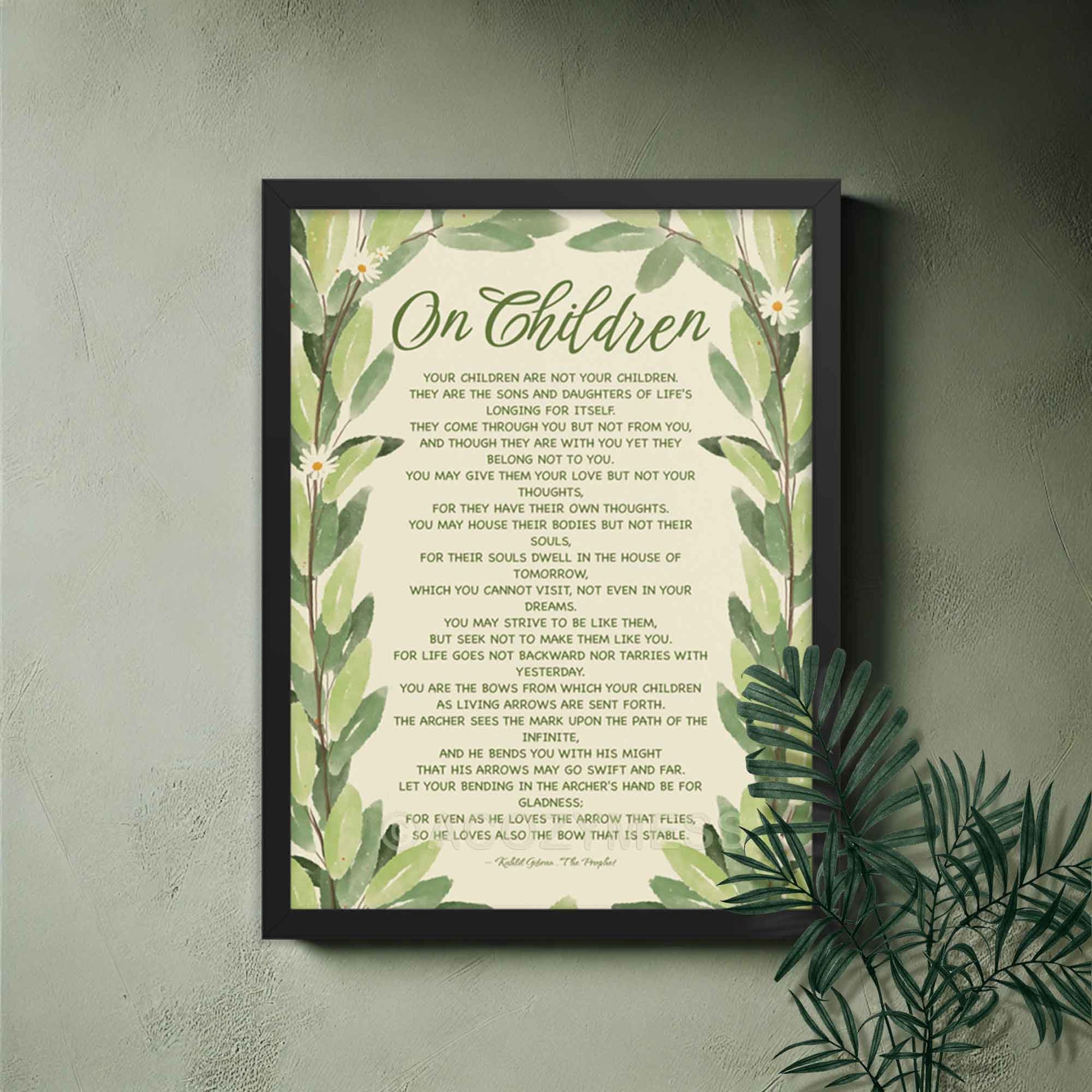 Poster featuring Kahlil Gibran’s words, ‘Your children are not your children. They are the sons and daughters of Life’s longing for itself...’ with a leaves illustration, displayed in black frame.