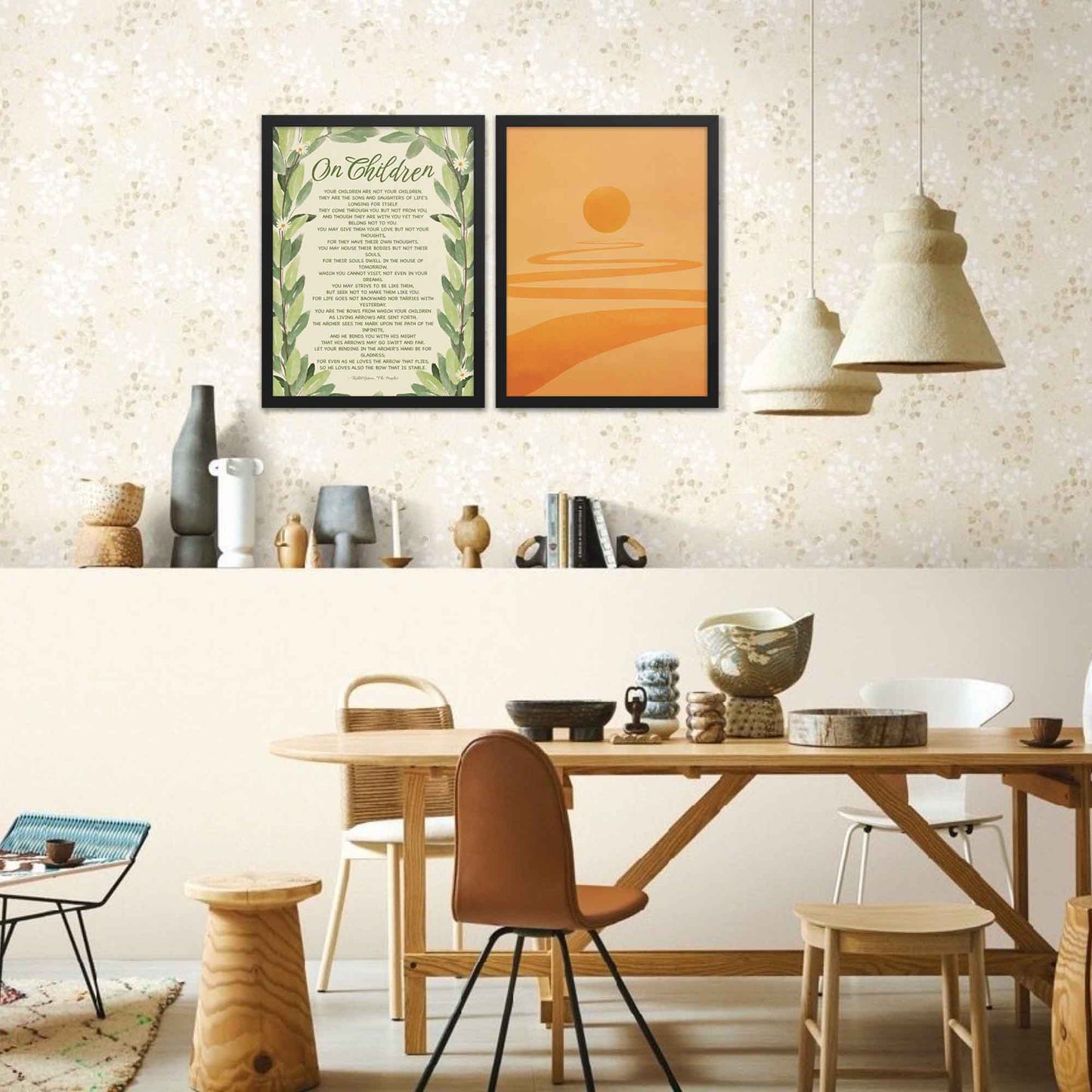 Poster featuring Kahlil Gibran’s quote, ‘Your children are not your children. They are the sons and daughters of Life’s longing for itself...’ with a leaves illustration, displayed in black frame on a dining room wall .