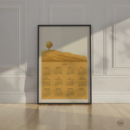 2026 calendar in yellow and beige  displayed on black frame