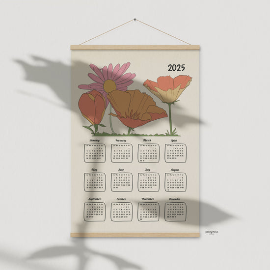 2025 yearly calendar poster with an illustrated floral design, with oakwood  hanger.