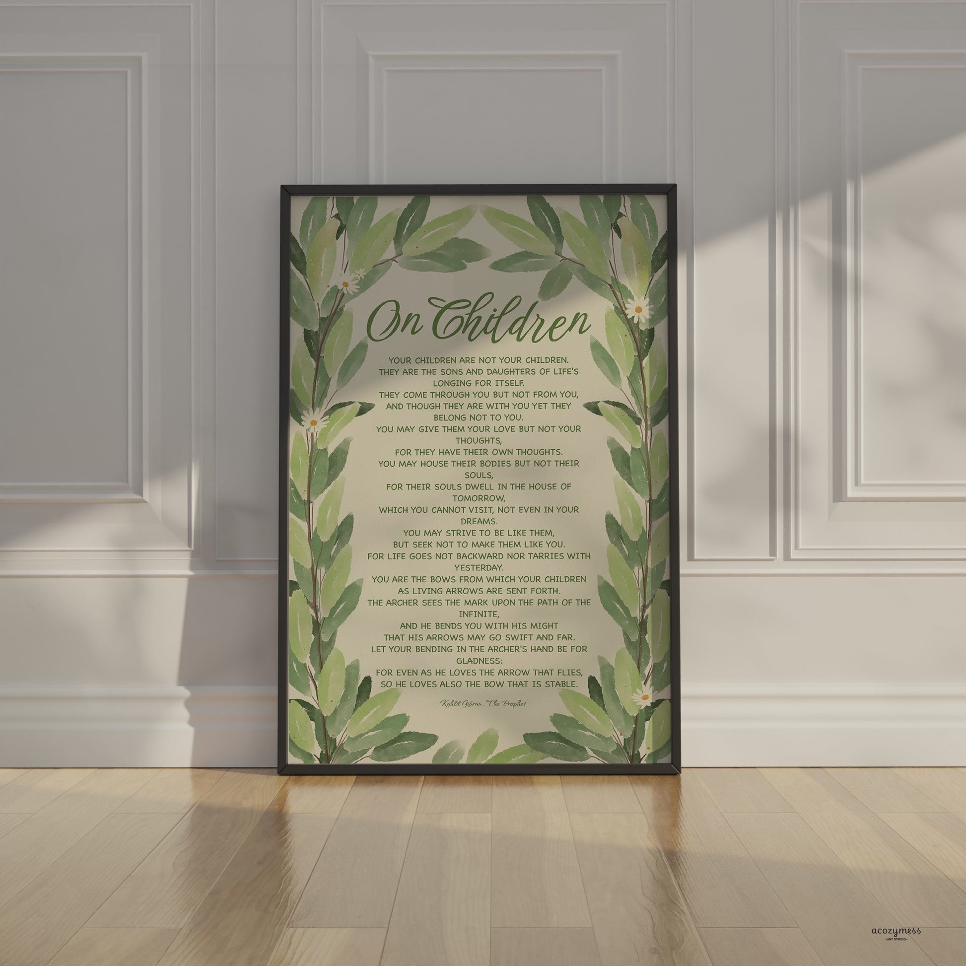 Kahlil Gibran Poster featuring his quote, ‘Your children are not your children. They are the sons and daughters of Life’s longing for itself...’ with a leaves illustration, displayed in black frame.