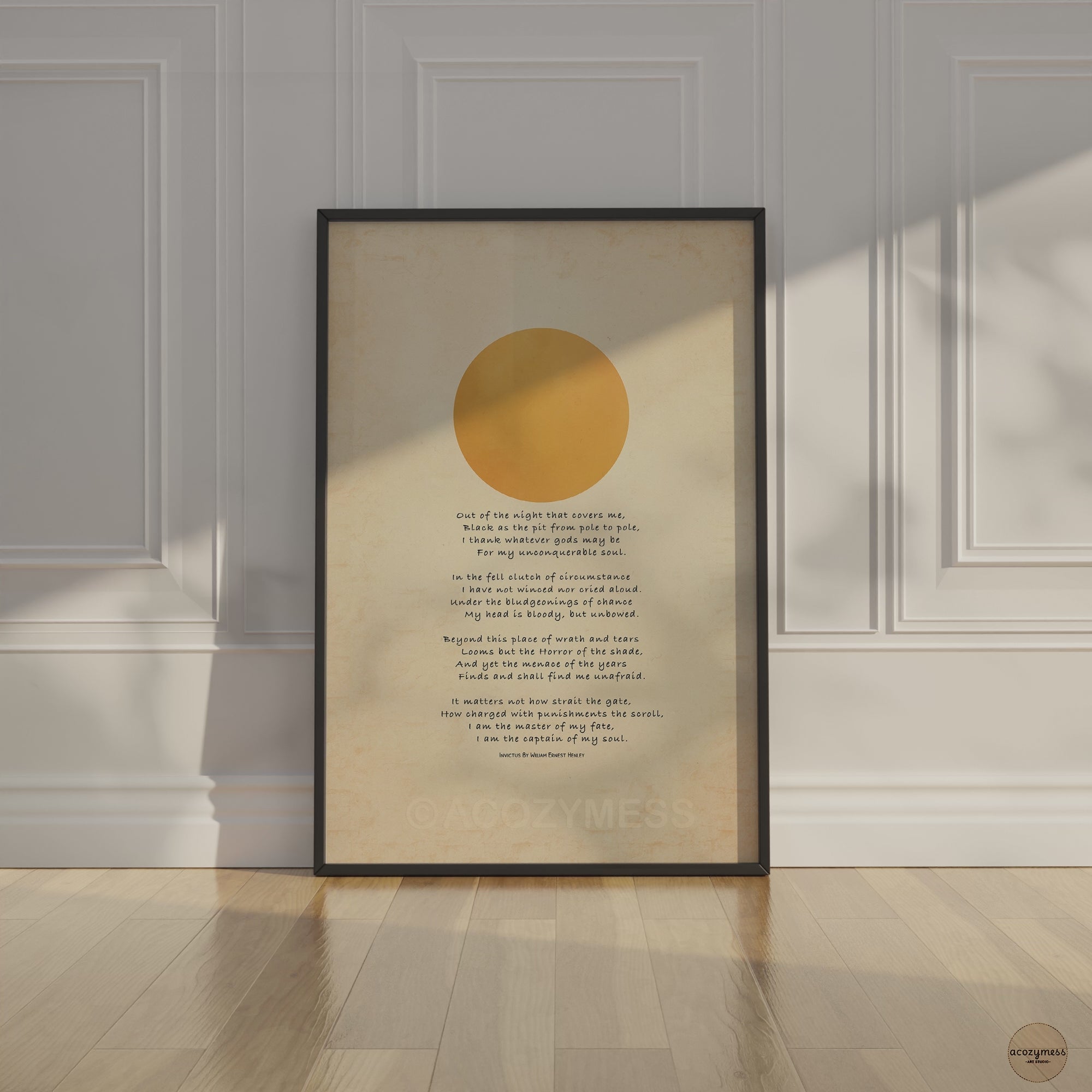 Invictus poem with sun art displayed in black frame