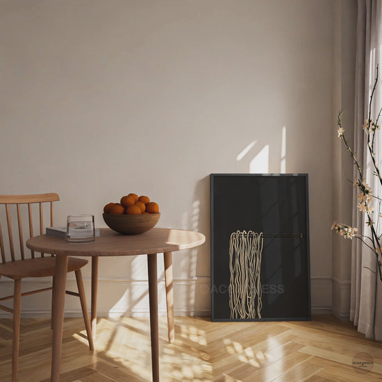 Black-framed ramen wall art with chopsticks noodle illustration in black, gray, and beige for modern kitchen decor.