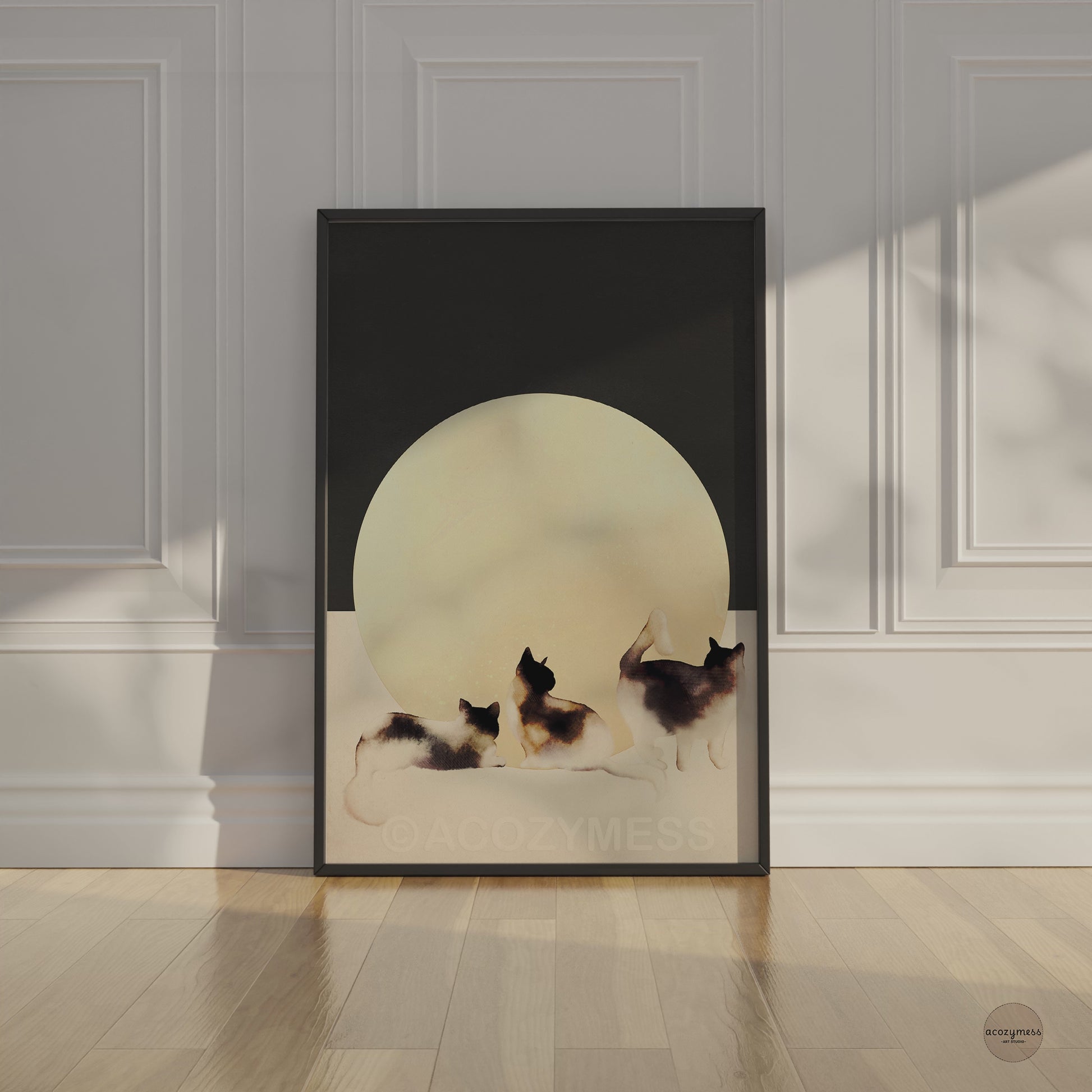 Contemporary cat wall art in black frame—three cats on dark gray and beige background for Scandinavian-style decor.