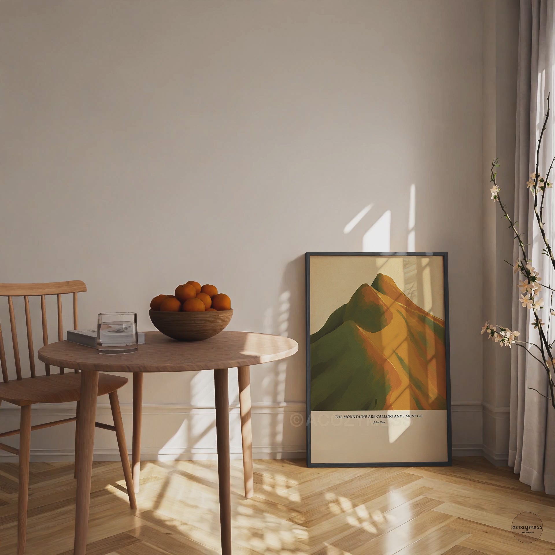 John Muir inspirational mountain quote wall art presented in a black frame, with a warm-hued scenic landscape.