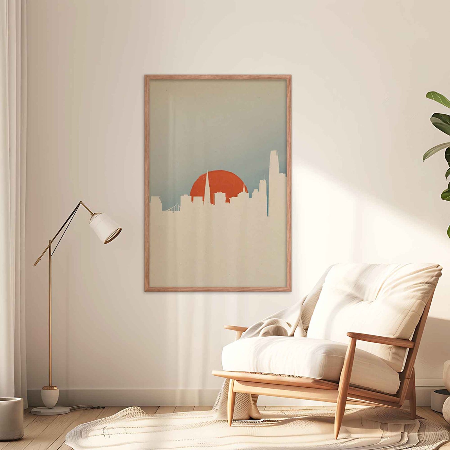 San Francisco skyline poster with minimal color palette and design in white, orange and blue, displayed in oakwood frame on a living room wall.