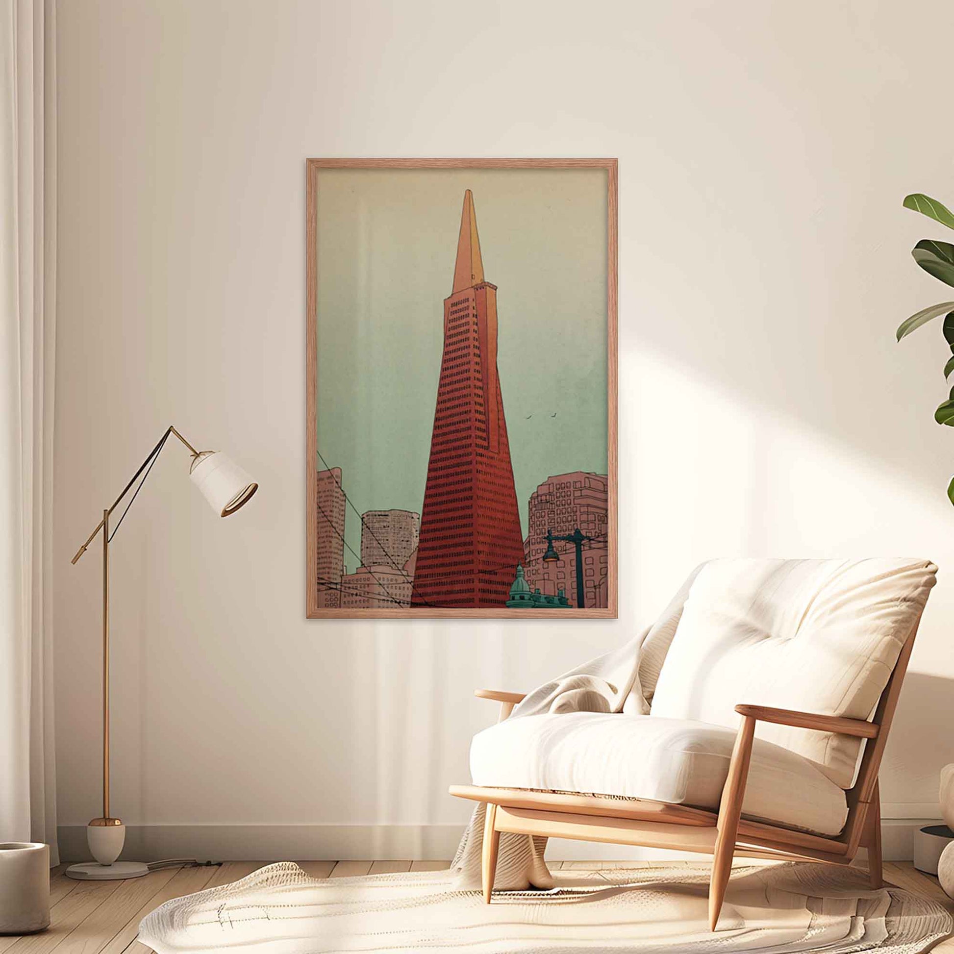 San Francisco Illustrated poster featuring Transamerica Pyramid displayed in oakwood frame on a living room wall.