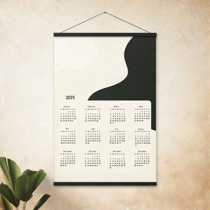 2025 yearly calendar poster with minimalist design, in black hanger, perfect for modern home or office decor.