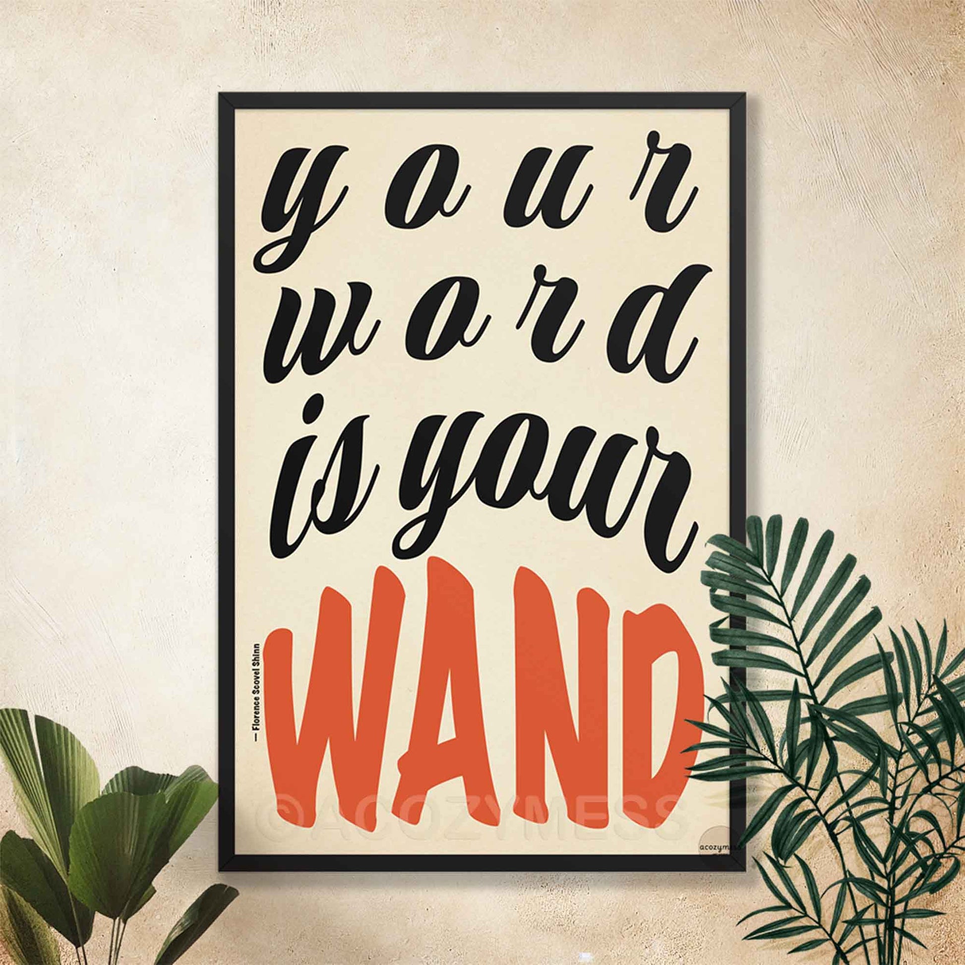 Framed poster with motivational quote 'your word is your wand' on a beige background