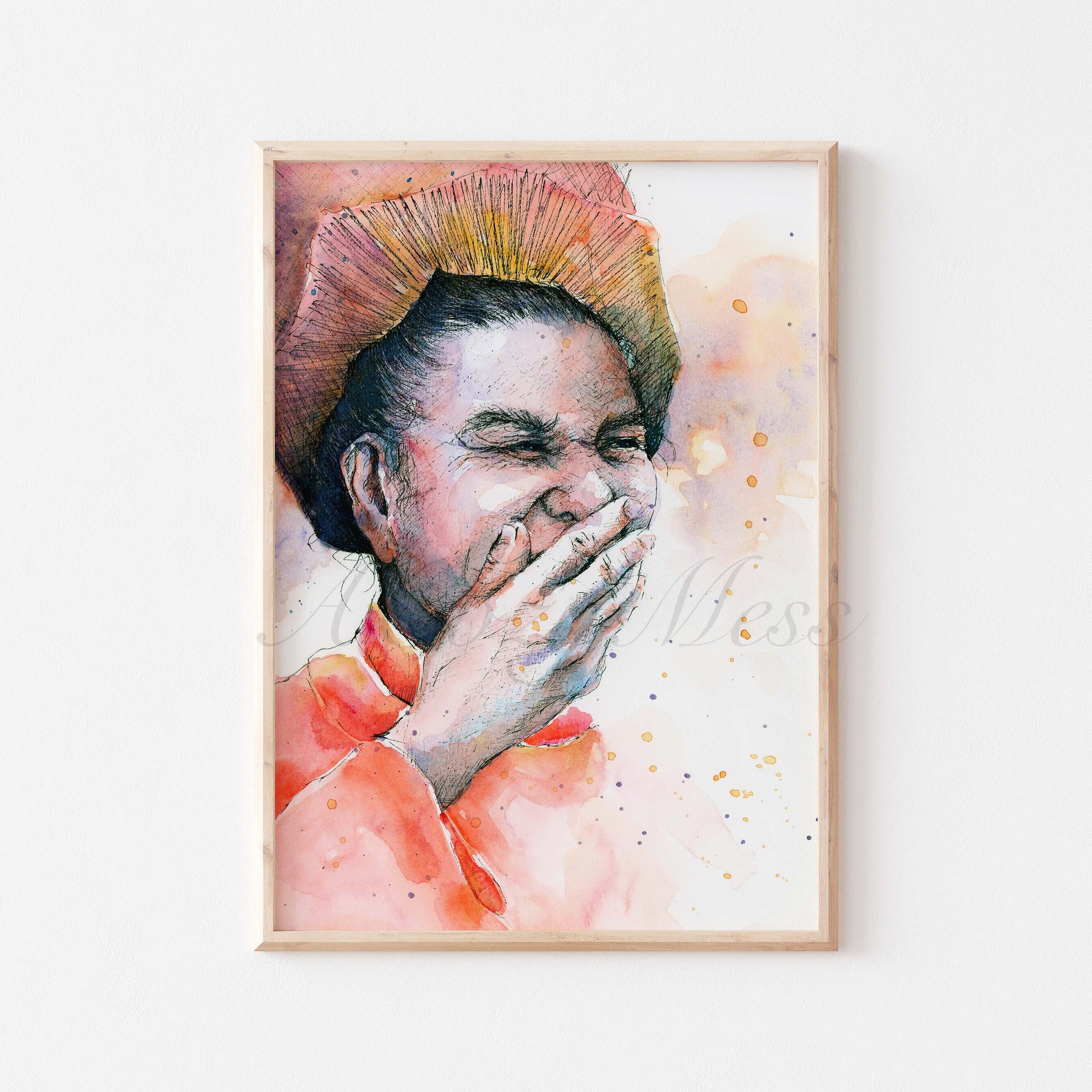 Poster of an Old Woman laughing in orange, yellow & purple in light wood frame display.
