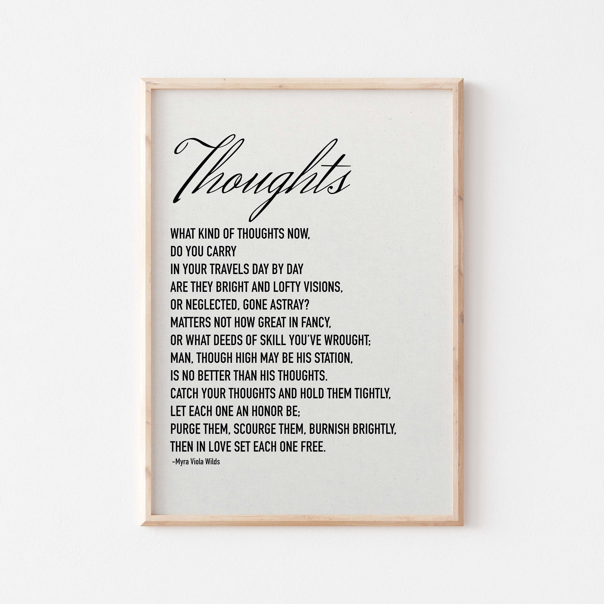 Thoughts poem by Myra Viola Wilds black on white poster in wood frame mockup