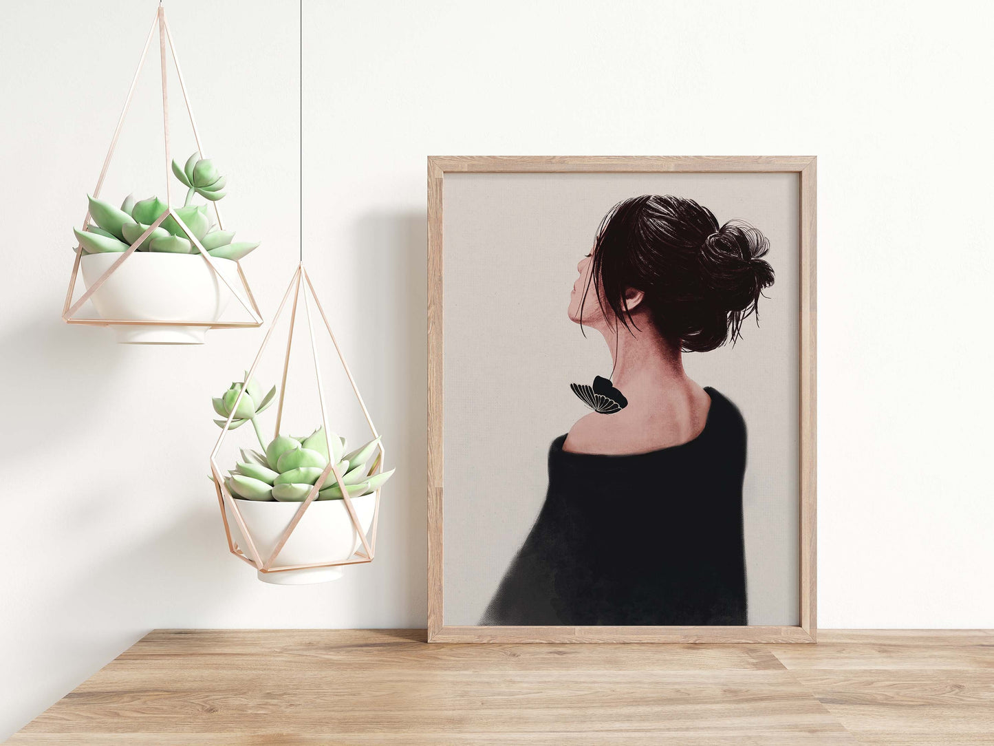 Woman in black dress & a butterfly sitting on her shoulder with beige background poster displayed in wooden frame