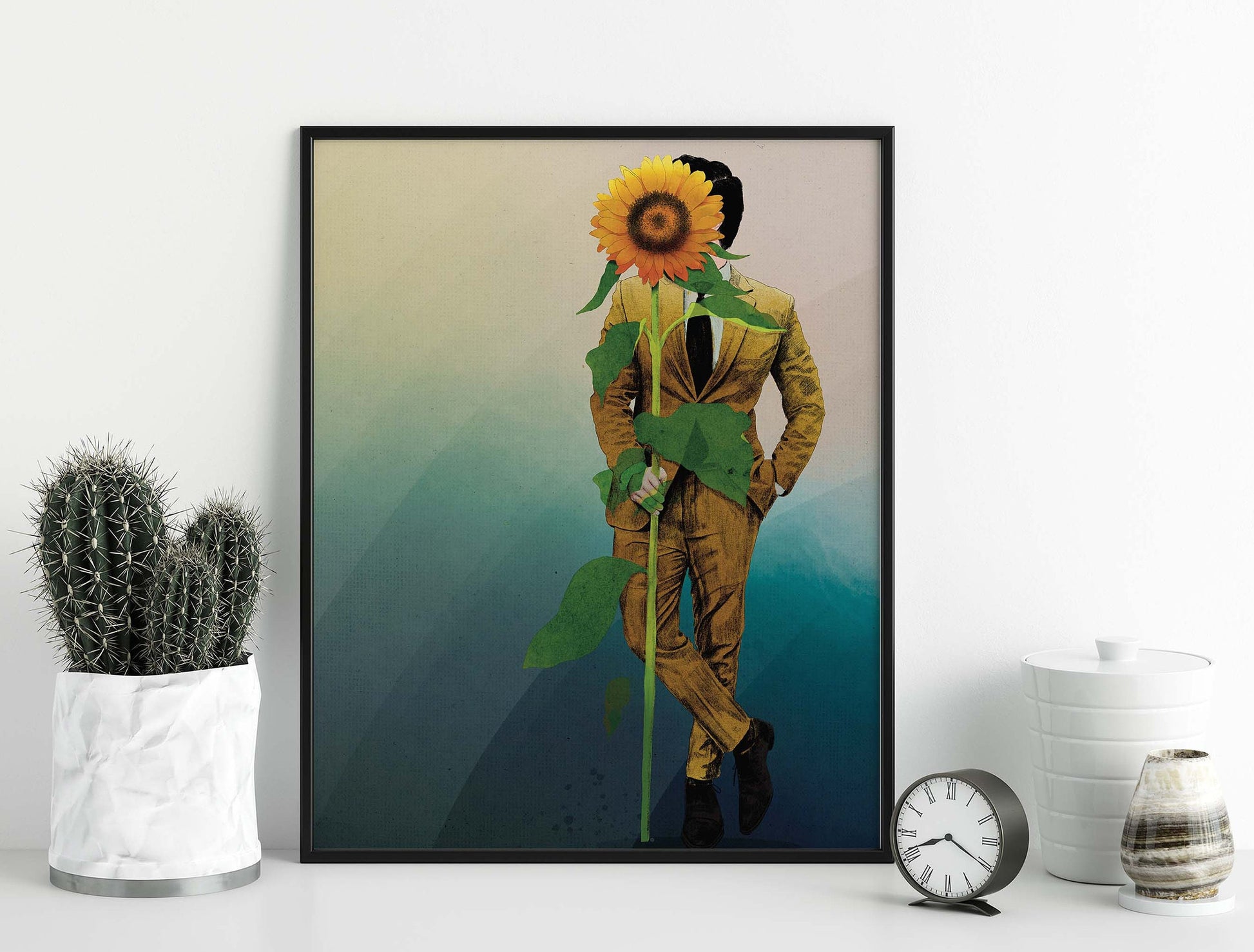 Man in yellow suit holding sunflower on gradient blue background poster in black frame