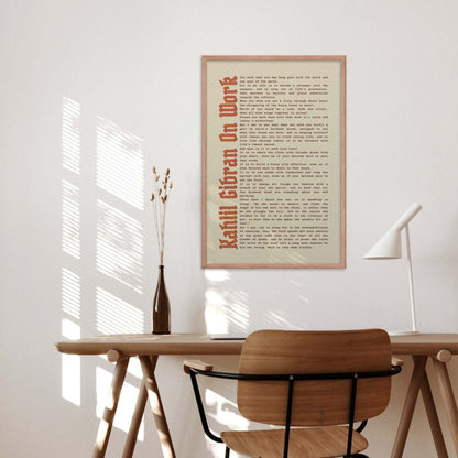 Work motivational poster by Kahlil Gibran in oakwood frame in a office or study wall